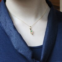 「『ピアノの森』ショパンのト音記号ペンダント」使用イメージ。