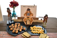 懇親会で振る舞われた「銭形のとっつぁん稲荷＆金塊玉子焼き」。