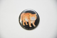 「マイケル シークレット Tシャツ」に付属する缶バッジ。