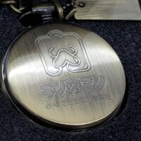 キン肉マンをモチーフにした懐中時計。