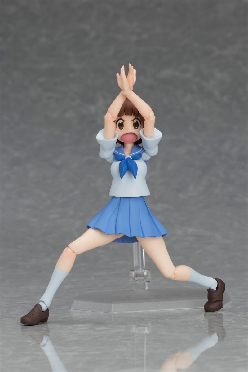 「figma 満艦飾マコ」。今にも「ハーレルヤ！」という歌が聞こえてきそうなポーズをとらせることもできる。