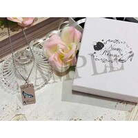 なるとりんねの名前が刻印されたネックレス。