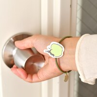 「静電気軽減ヘアポニー」の使用イメージ。