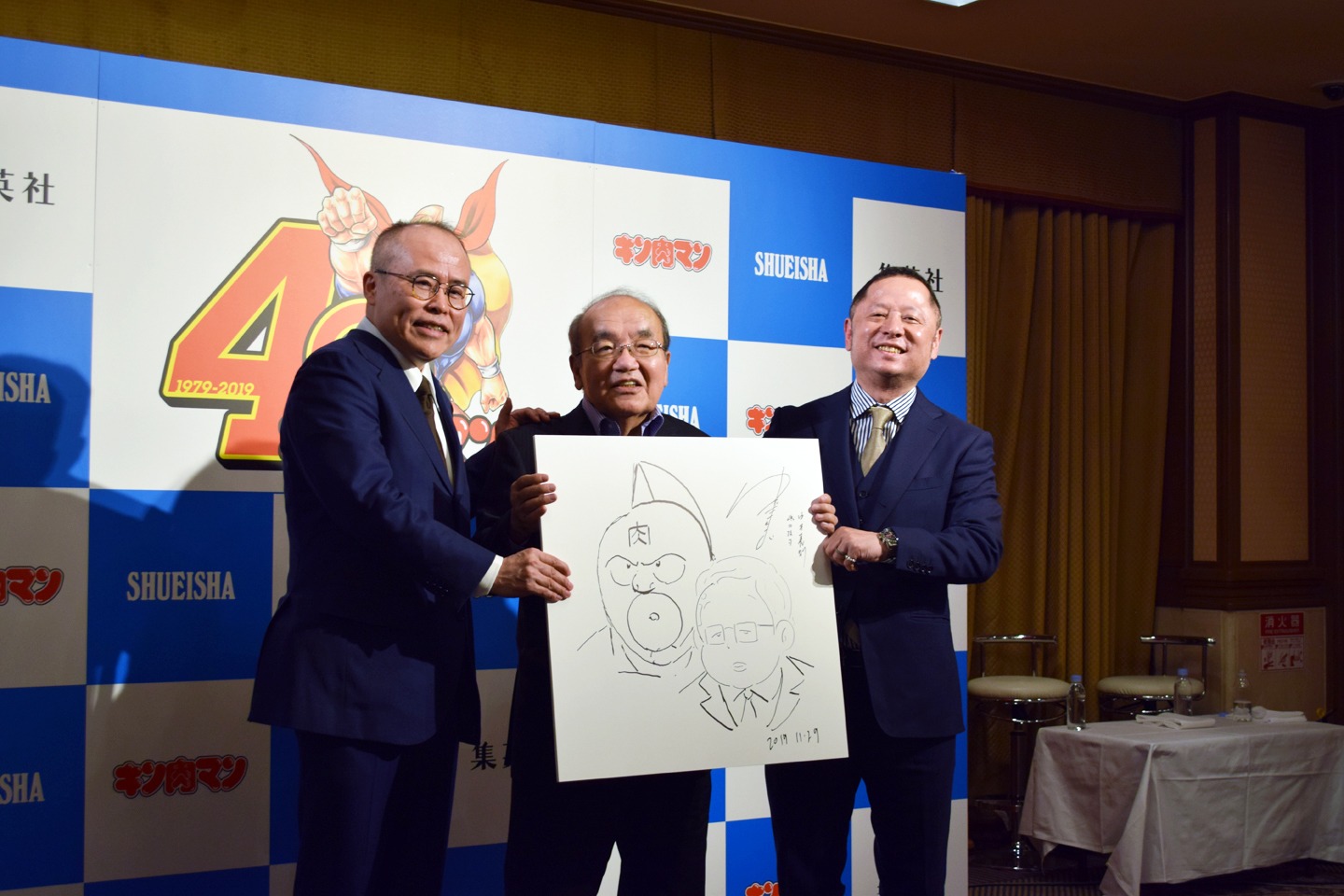 左から中野和雄氏、中井義則、嶋田隆司。