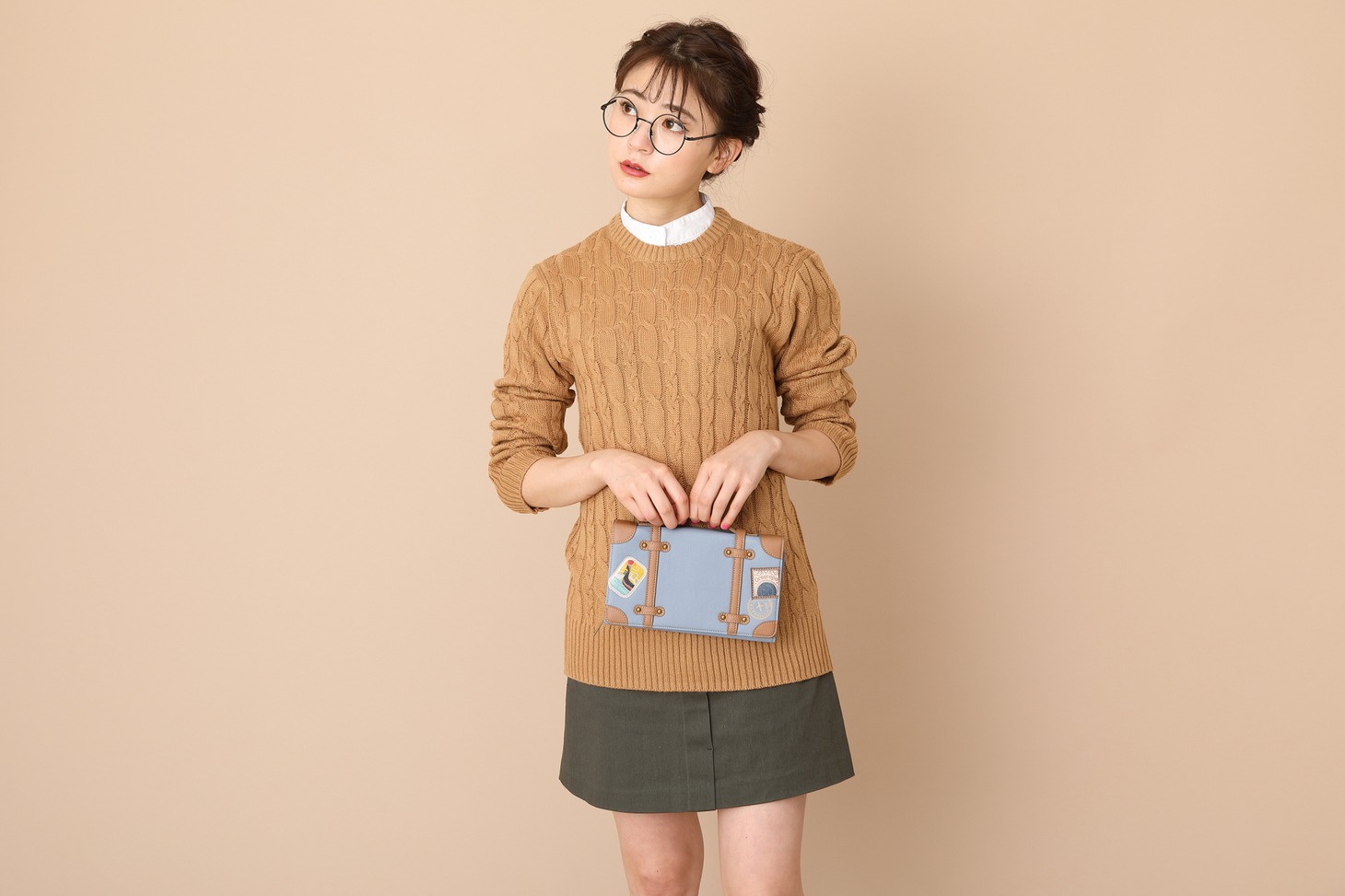 イタリアモデルのショルダーマルチケースの使用イメージ。