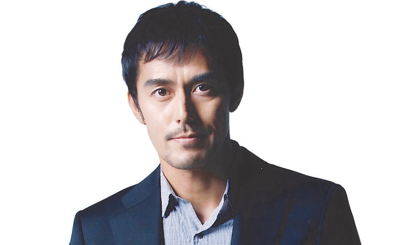桜木建二役の阿部寛。