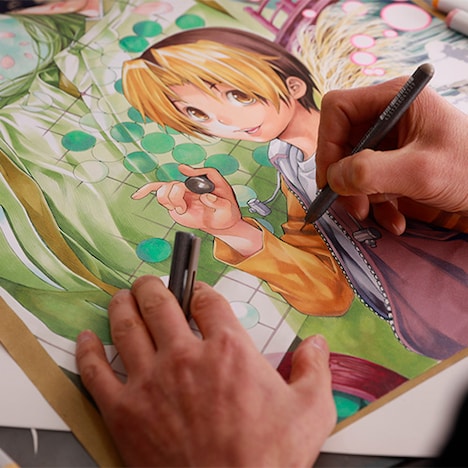 「ヒカルの碁」のイラストを描く小畑健。