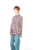 中山咲月扮するリタ。