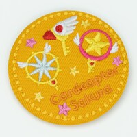 「カードキャプターさくら クリアカード編 トレーディング刺繍缶バッジ」の1種。