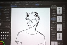 岩井勇気によるライブドローイングの様子。