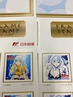 「Ark Performance直筆サイン入り オリジナル切手」は84円切手10枚が1シートになったもの。デザインはイオナとタカオの2種が、各50シート用意される。