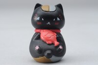 LaLa2021年2月号に付属する黒ニャンコフィギュア。(c)緑川ゆき／白泉社