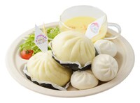 「める特製超科学で増え続ける肉まん（みかん盛り）」。めるがみかんのために好物の肉まんを永遠に増やし続ける装置を作るものの、その装置が止まらなくなり……という場面をイメージして作られたという。