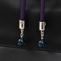 「クロロ=ルシルフル モデル」のバッグ。