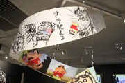 アニメ制作会社の仕事場をイメージした展示物の一部。