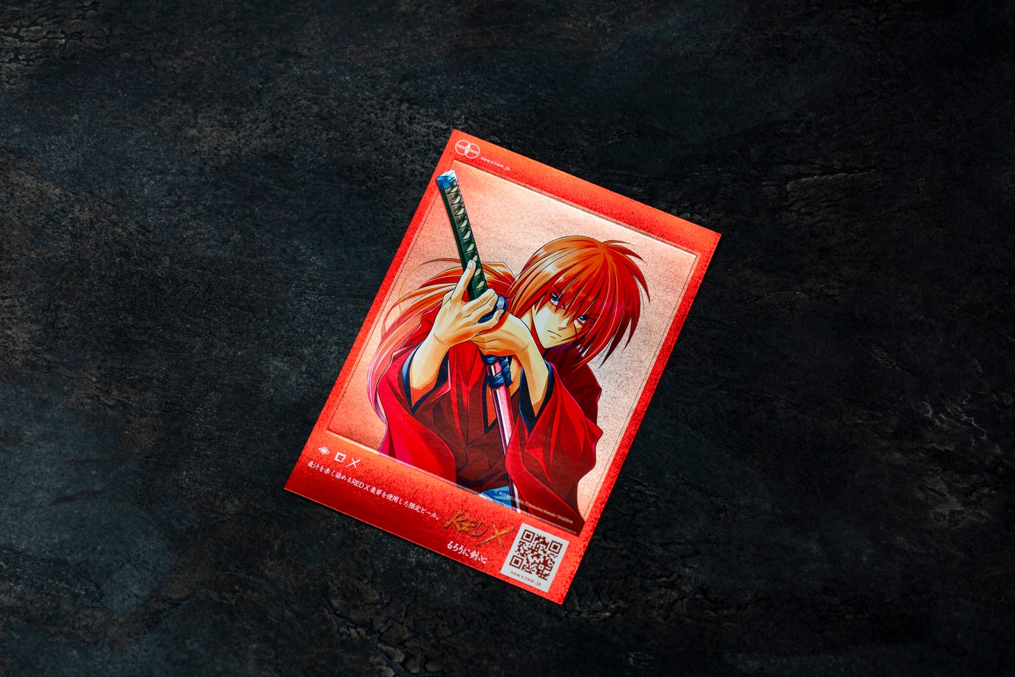 「剣心 RED X」限定ボトルのステッカー。(c)和月伸宏／集英社