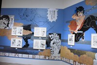 「『鬼滅の刃』吾峠呼世晴原画展」の様子。