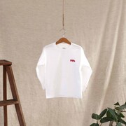 りぼんをモチーフにした子供用のロングTシャツ。