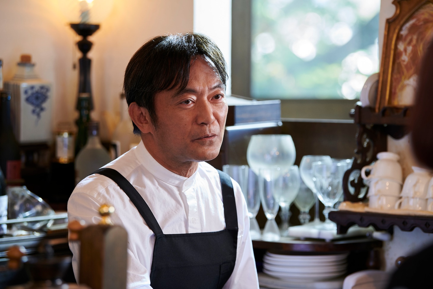 渡辺いっけい扮する前園哲郎。