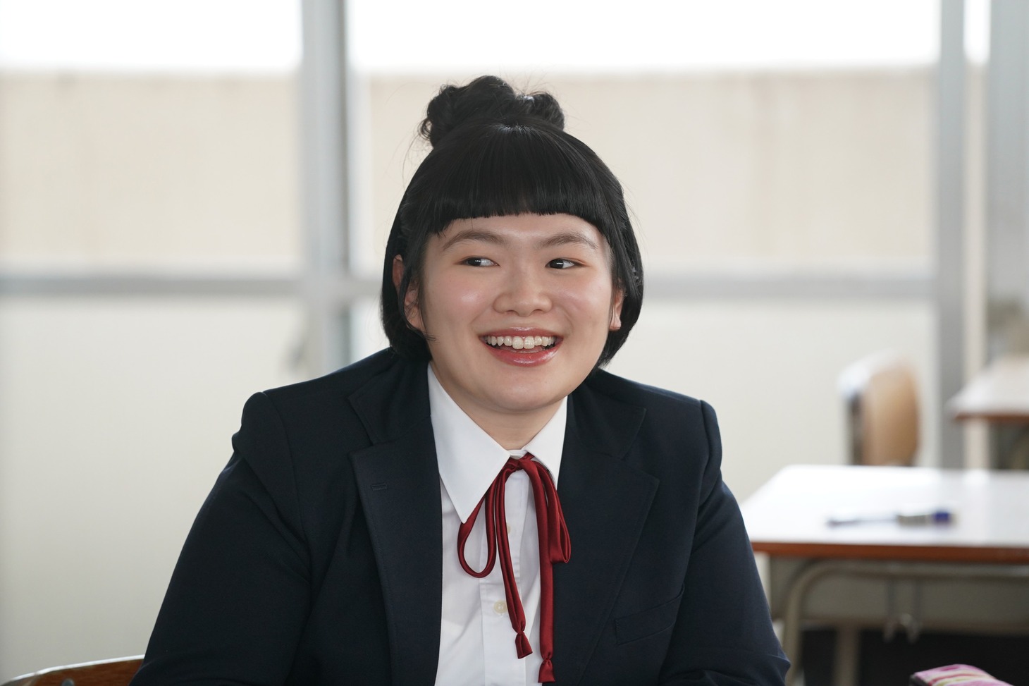富田望生扮する守田巻。
