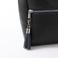 早川アキモデルのリュック。