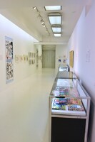 「キャッツ♥アイ40周年記念原画展 ～そしてシティーハンターへ～」の様子。