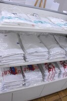 「キャッツ♥アイ40周年記念原画展 ～そしてシティーハンターへ～」の物販の様子。