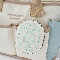 「コジコジ」をモチーフにしたハンドバッグ。