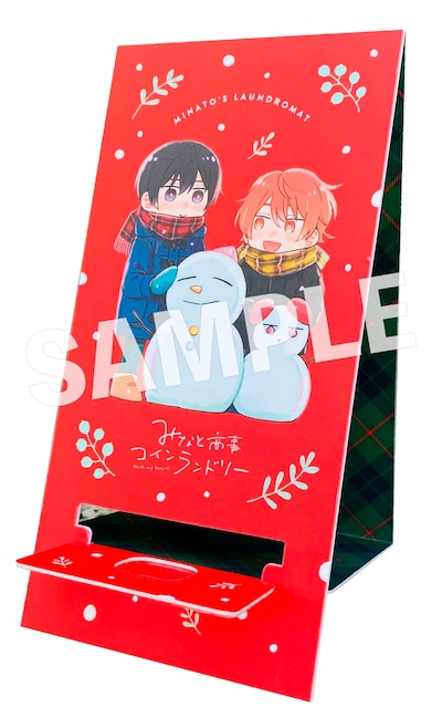 「みなと商事コインランドリー」のスマホスタンド。
