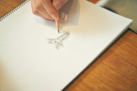 堀江さんのイメージをスケッチブックに描いてみました。