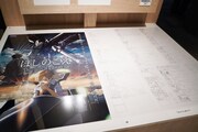 新海誠監督による短編アニメーション映画「ほしのこえ」の展示。