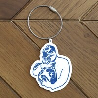 スカート「222だから実家の猫が嫌そうな顔してる写真置いときますね」キーホルダー