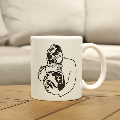 スカート「222だから実家の猫が嫌そうな顔してる写真置いときますね」マグカップ