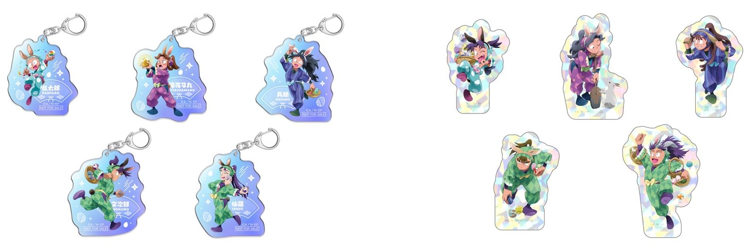 ミニアトラクションの景品「成功賞：アクリルキーホルダー」（左）と「参加賞：ダイカットステッカー」（右）。