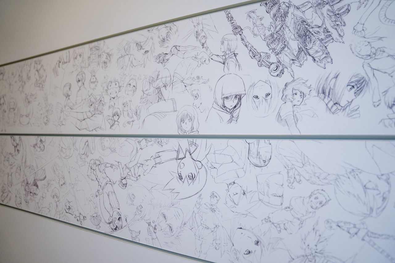 ボンズの社内に展示してあるイラストボード。歴代のキャラクターが描かれている。