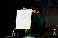 梶田大嗣による「天高く舞う泣いた小西克幸」。