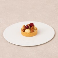 「なんか固い実のキャラメルカスタードタルト」