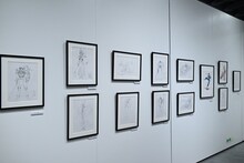 「DESIGNS 永野護デザイン展」より、ゲームキャラクターなどアニメ・マンガ以外の仕事をまとめた展示エリア。(c)GAME STUDIO (c)EDIT (c)MAY MUSIC (c)SEGA (c)TEKKENTM3 & (c)Bandai Namco Entertainment Inc. (c)KADOKAWA CORPORATION/Ishizu Yasushi