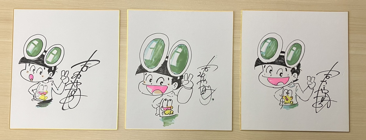 吉沢やすみのイラスト入りサイン色紙。
