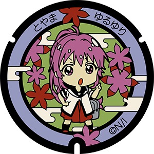 杉浦綾乃のマンホール蓋。富岩運河環水公園内に設置。