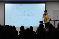 完成した色紙には坂道と巻島の姿が描かれた。