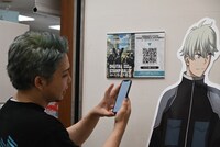 オリオン書房ノルテ店でスタンプをゲットした福西勝也。