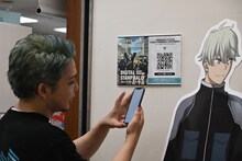 オリオン書房ノルテ店でスタンプをゲットした福西勝也。