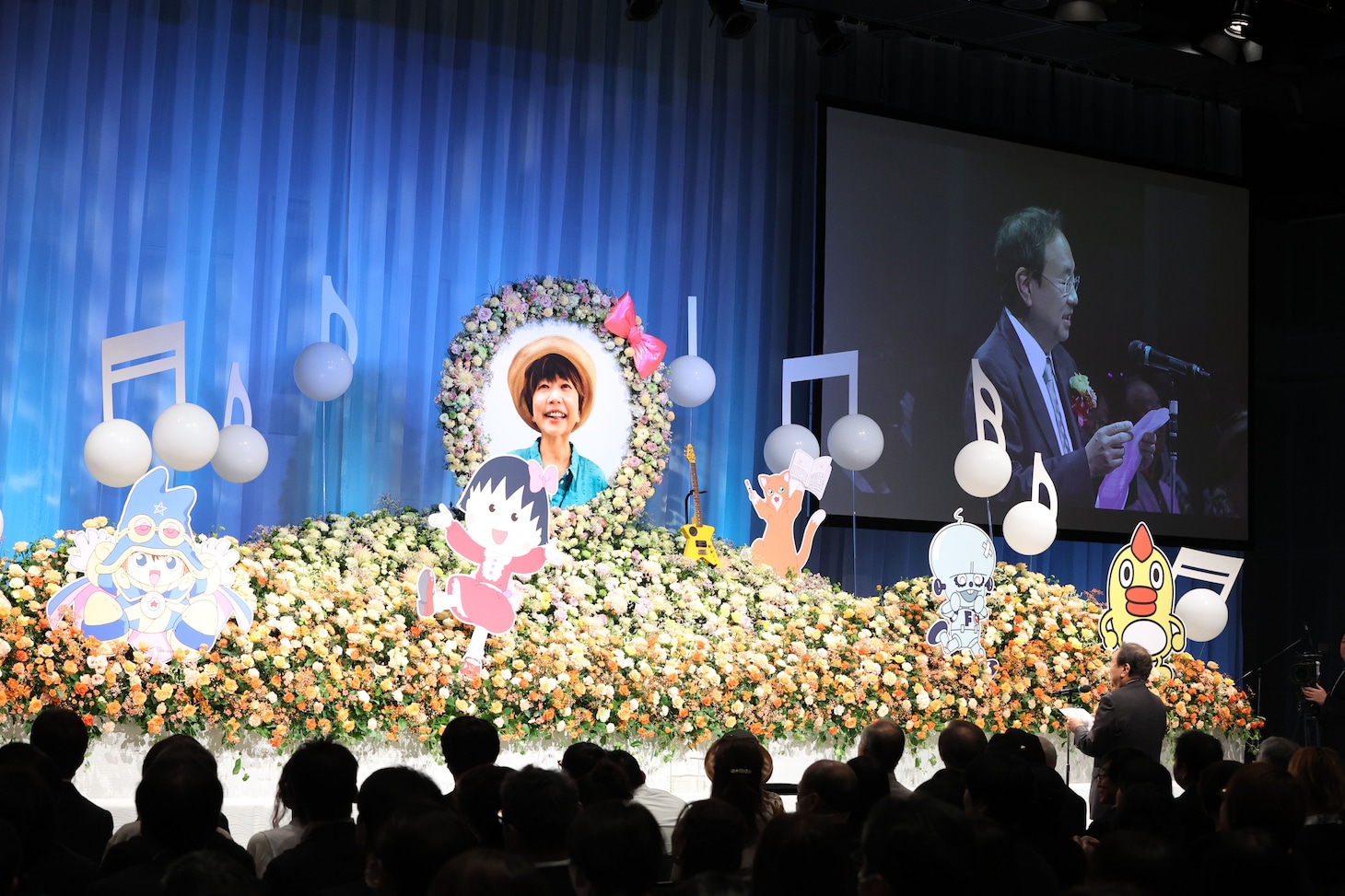 弔辞を述べる清水賢治氏。
