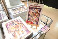 「～画業35周年記念～渡瀬悠宇の世界『ふしぎ遊戯』原画展」で販売されているグッズの一部。(c)渡瀬悠宇／小学館