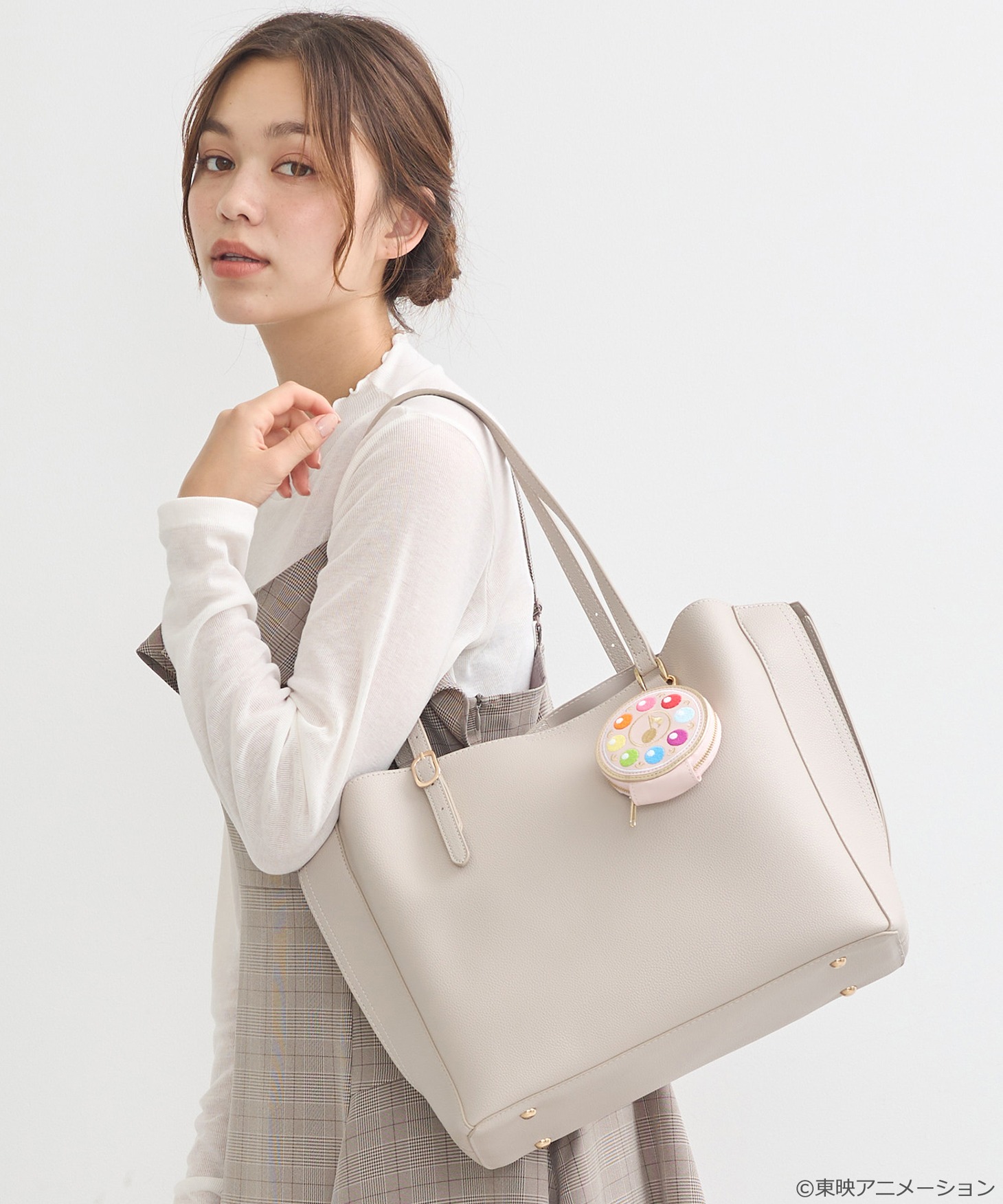 「みならいタップ ミニポーチ」の使用例。