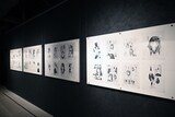 「博 漫画家デビュー15周年記念『明日ちゃんのセーラー服』原画展」の様子。