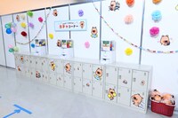 「休み時間『中間やすみ』」コーナー。ガチャでヨムビーのグッズや、コミックシーモアで使用できるポイント券などが用意された。