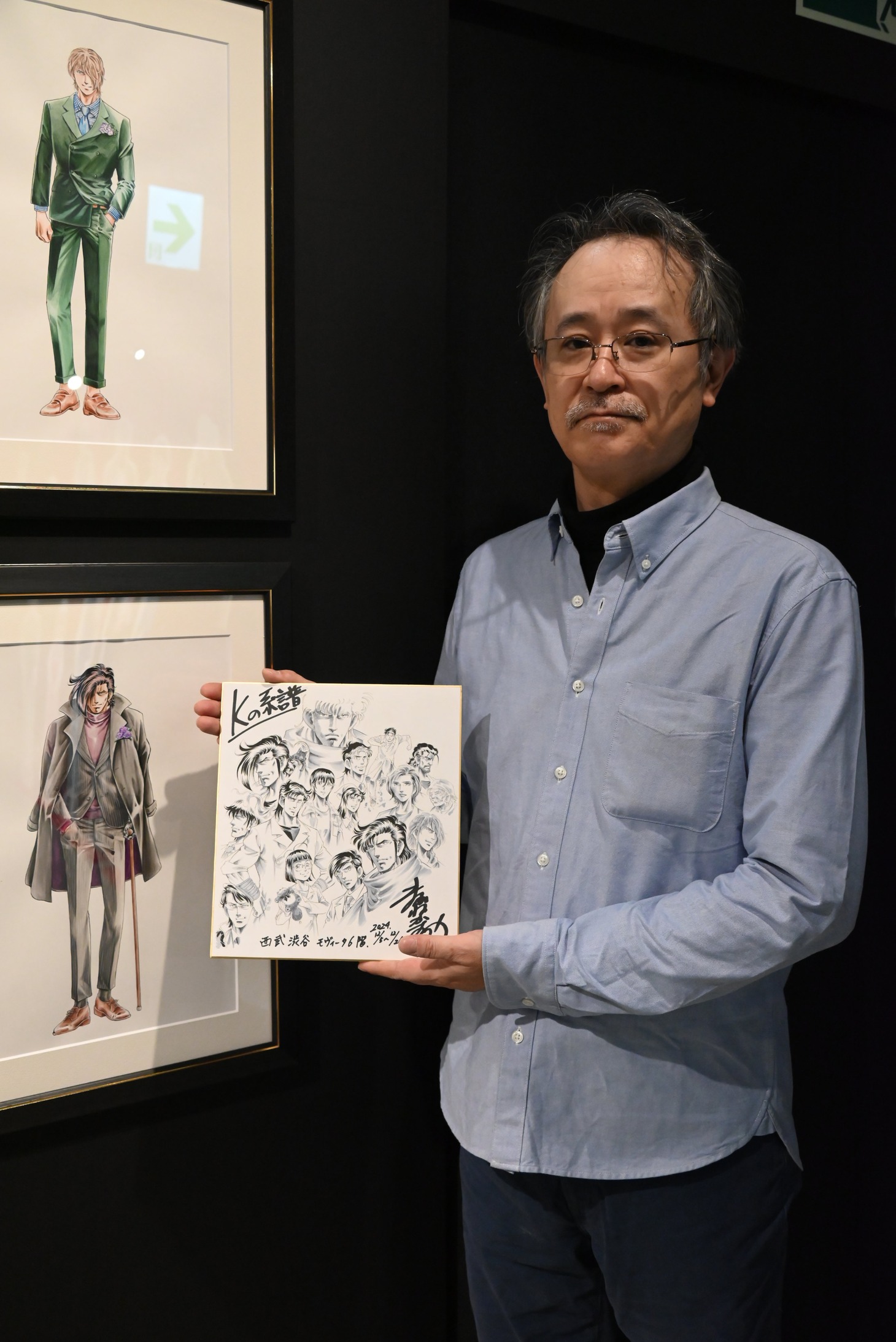 真船一雄。手にはサプライズで用意してくれたサイン色紙が。