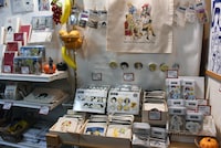 「漫画家生活60周年記念 青池保子展 Contrail 航跡のかがやき」で販売されているグッズの一部。